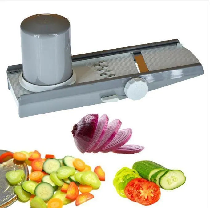 Vegetable slicer with sliced vegetables on a white background