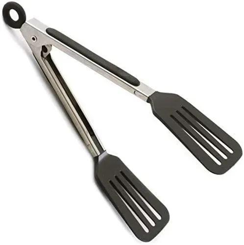 Black and silver kitchen spatula with tongs on a white background